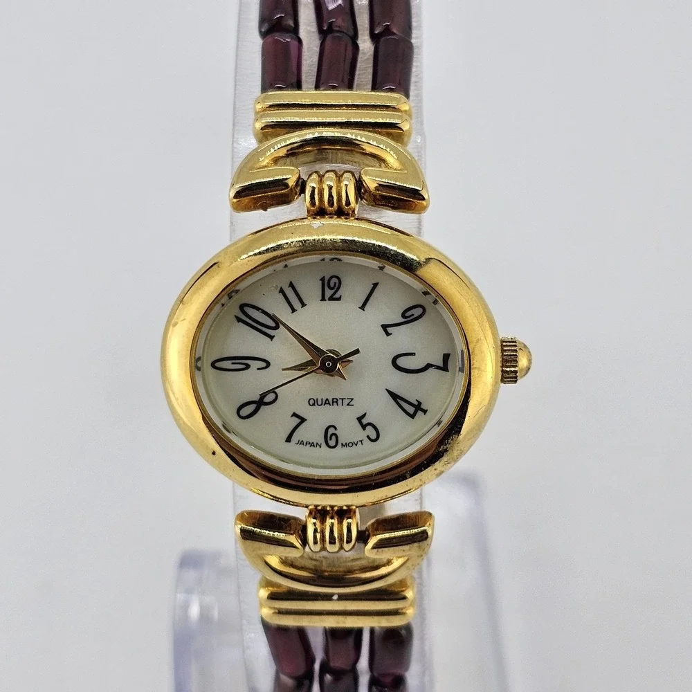 Women's Analog Watch‎ 25MM Light Yellow Dial Gold Purple Bands 6.75